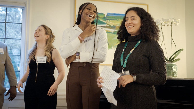 Three Rhodes Finalists laughing and smiling