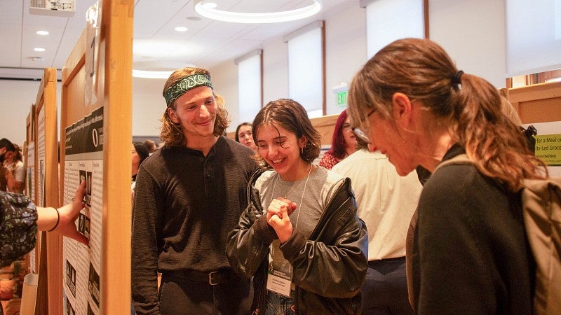students at undergraduate research symposium