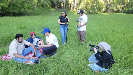 Diego Solorio (center crouched) filming on location. 