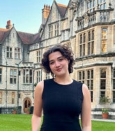 Gretchen Brockway standing in the Oxford University courtyard
