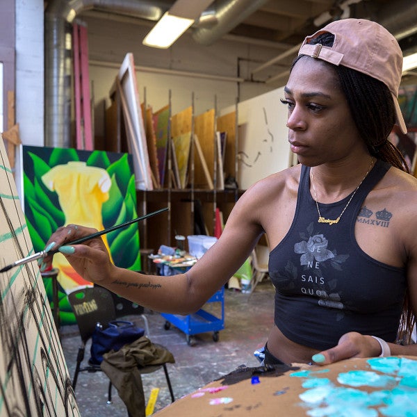 student painting in the studio