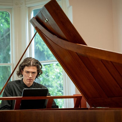Nikita Istratov playing the harpsichord