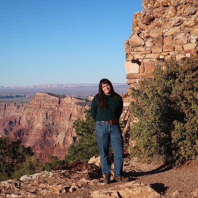 Rose Kapelka-Wolpoff stands in front of the Grand Canyon